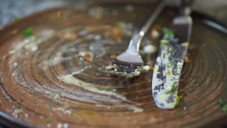 empty plate with cutlery