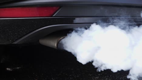 toxic gas coming out from exhaust of old car