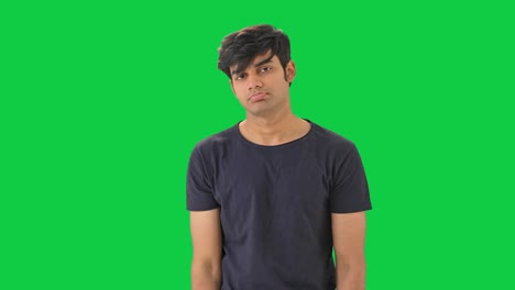 Upset-Indian-man-standing--Green-screen