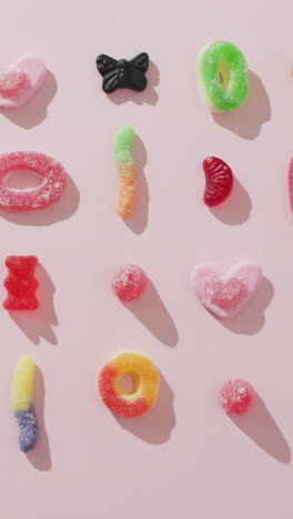 video of colourful jelly candy on pink background