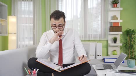 tired businessman devastated from work exhausted and sluggish.