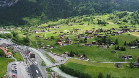 enchanting grindelwald, switzerland: awe-inspiring 4k drone footage of majestic swiss alps and traditional architecture