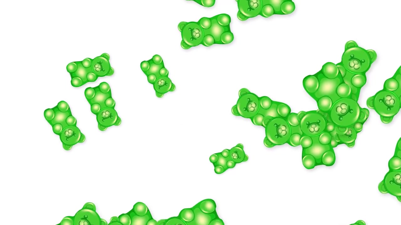 Green gummy bear candies fall and bounce across a white background in a playful animation.