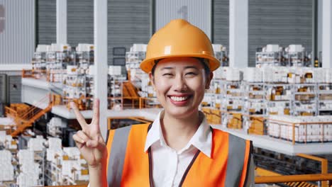 happy woman worker in warehouse