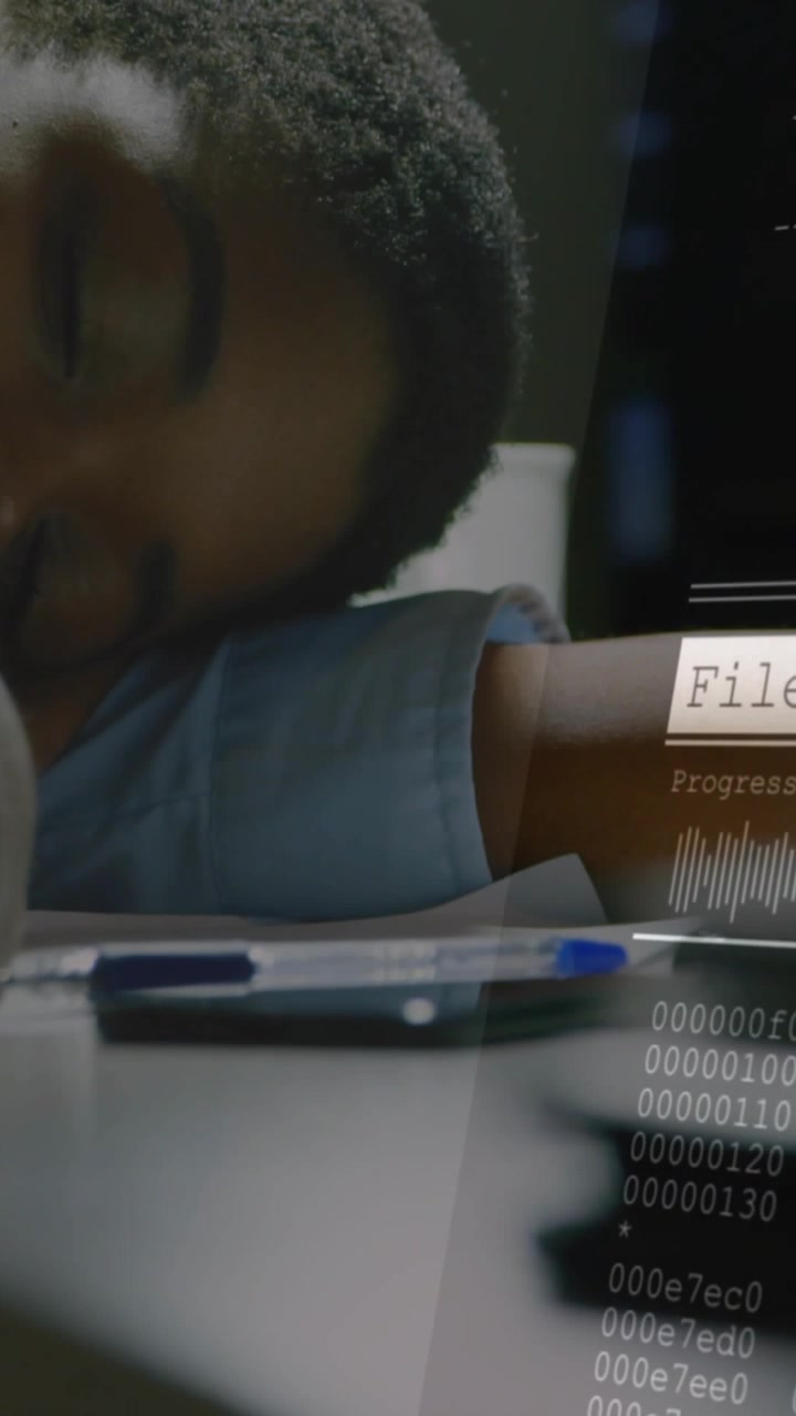 Vertical video: Tech file overlay appearing while waiting, woman resting head on desk, pen docs