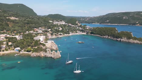 aerial pullback reveals amazing turquoise waters in corfu, greece