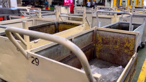 trolley carts are lined up in production at a factory