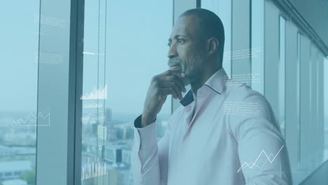 animation of data processing and diagrams over african american businessman thinking