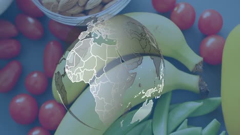 animación de un globo sobre frutas y verduras sobre la mesa