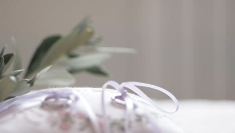 wedding rings on  a pillow