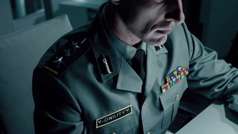 military officer reviewing documents