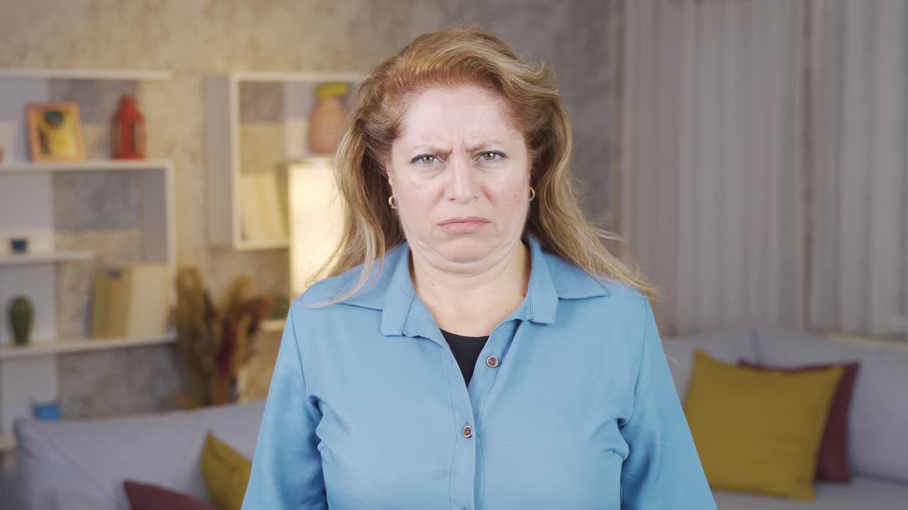 Mature woman is surprised.
