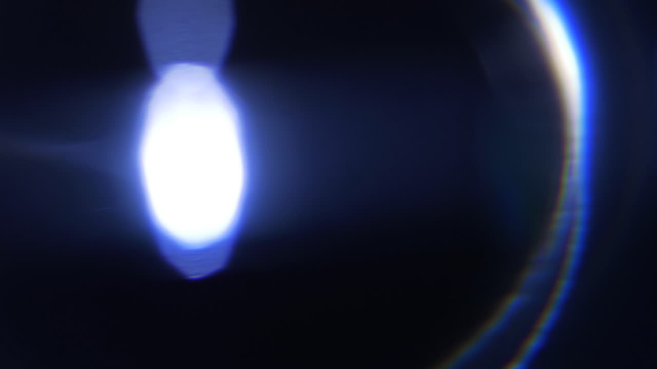 Transição Abstrata de Efeito de Luz com Reflexo de Lente Óptico