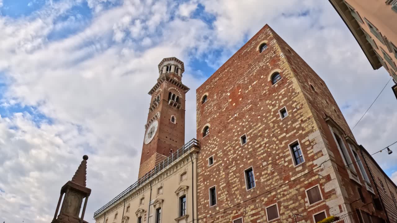 Ascent of Verona's 84m Torre dei Lamberti, capturing its architectural grandeur.