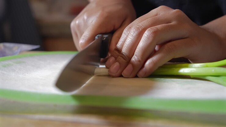 The perfect way to chop green onions - isolated close up