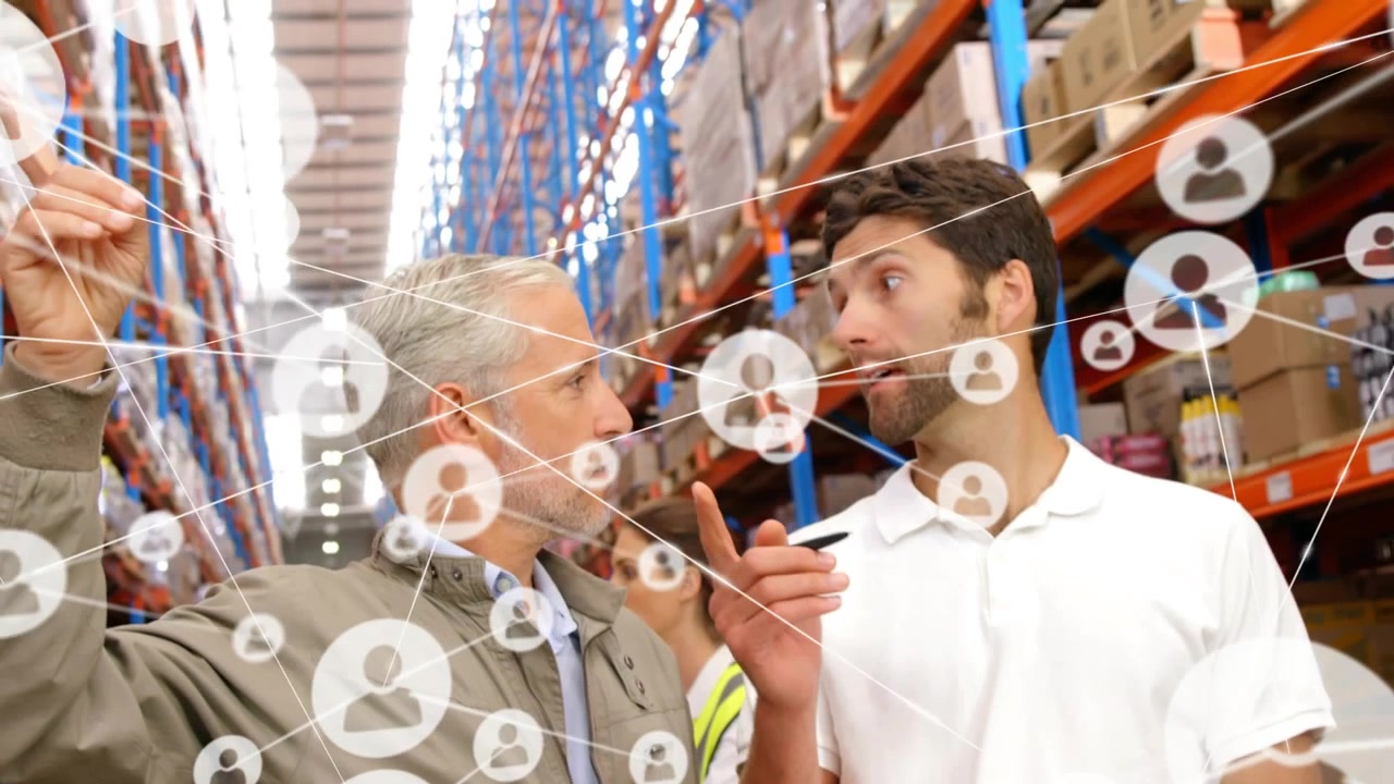Warehouse manager pointing up guiding clerk checking stock on clipboard while overlay linking racks