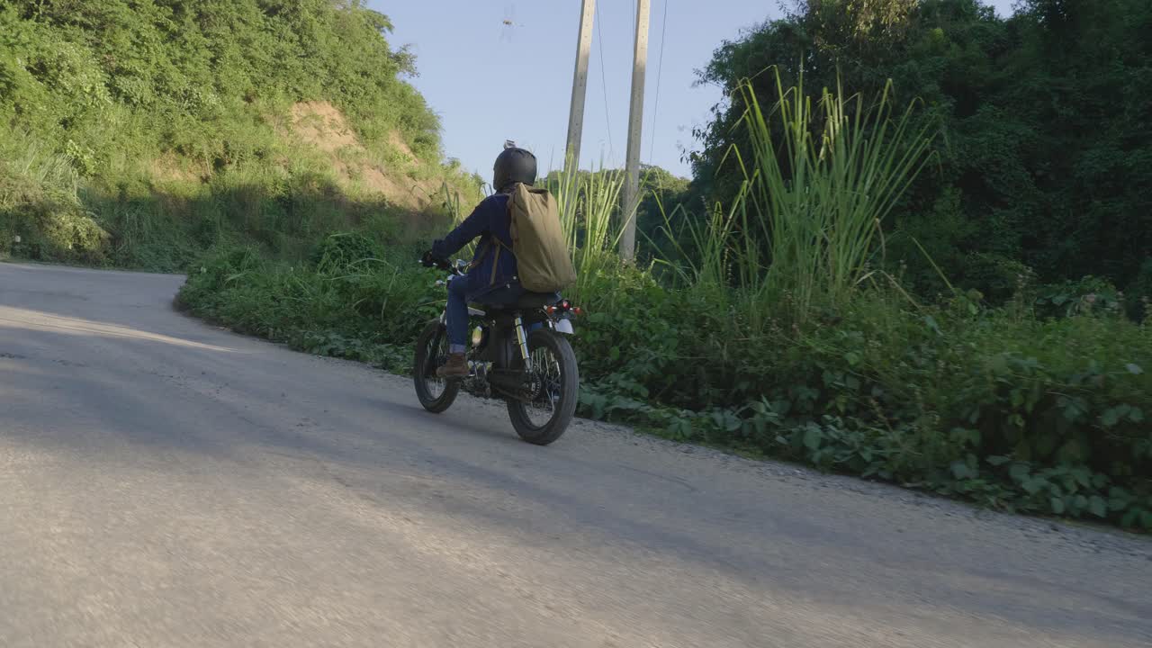 Motorcycle Adventure on a Winding Mountain Road
