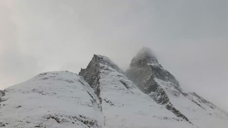 famous mountain peaks of otertinden, snowy mountain landscape, signaldalen norway - aerial shot