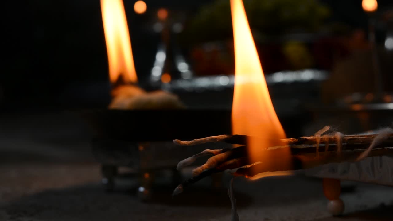 Closeup of burning pooja Aarti sticks in the temple during a navaratri festival