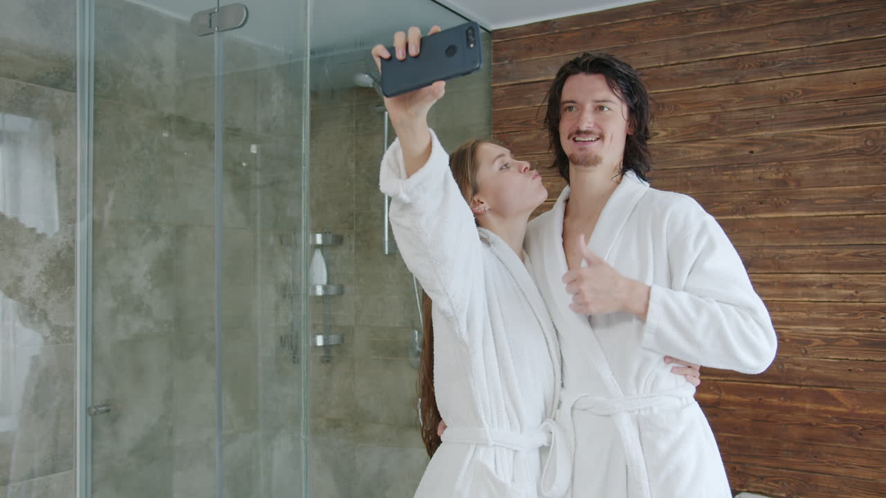Couple Taking a Selfie in a Modern Bathroom