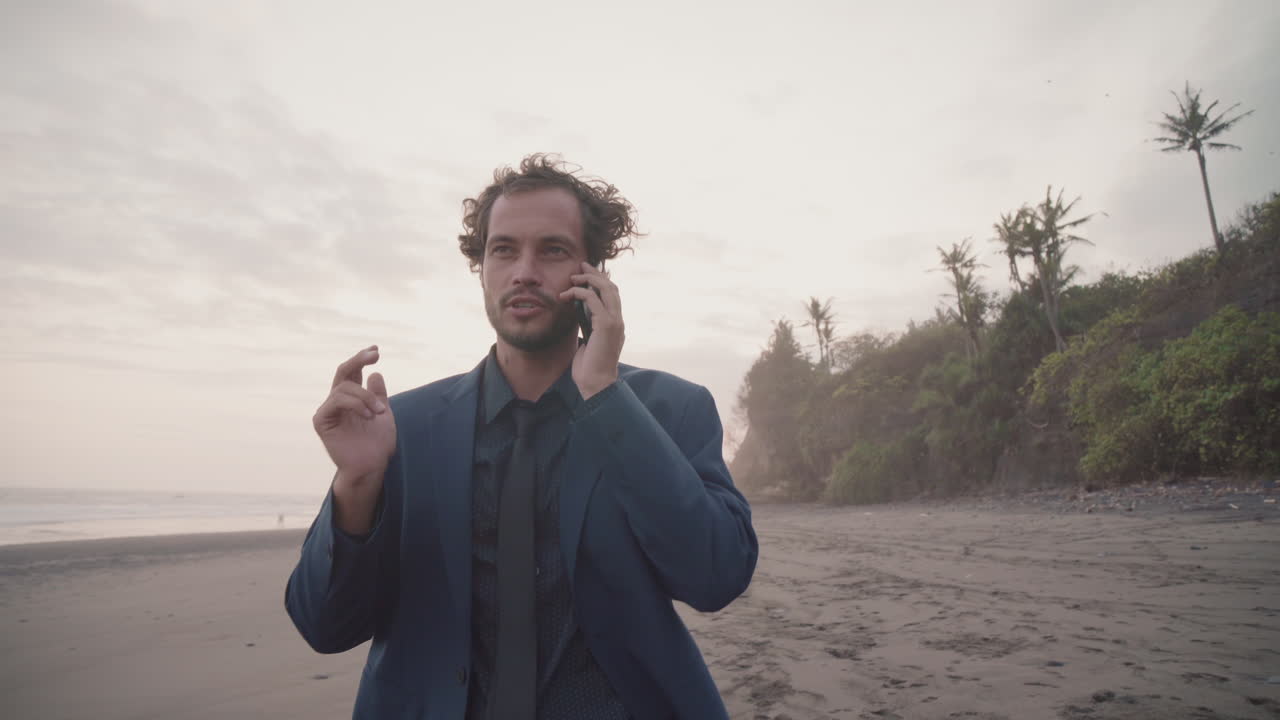 Drone Shot Of Businessman On Beach