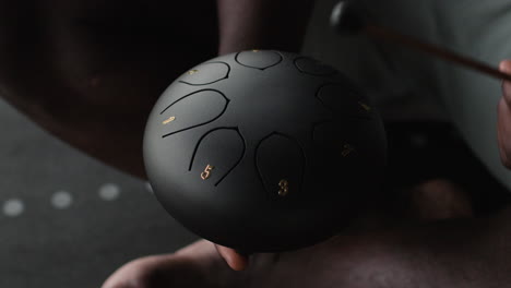 handpan in a person's hands
