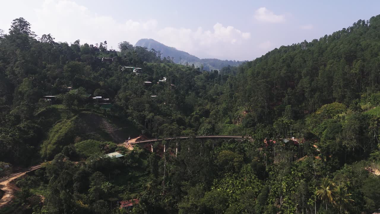 Fly towards nine arches bridge from far