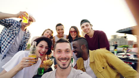 friends having fun on rooftop party