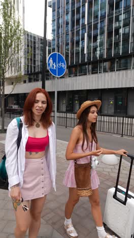 two women traveling through a city