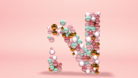 letter n made of beads, glass balls, pastel pearls, crystal jewels and gold