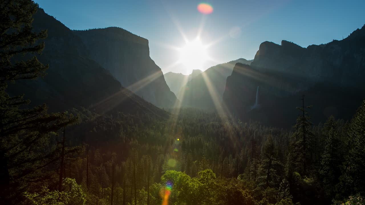 Time lapse of the sun rising over Yosemite Valley from the tunnel view vantage point