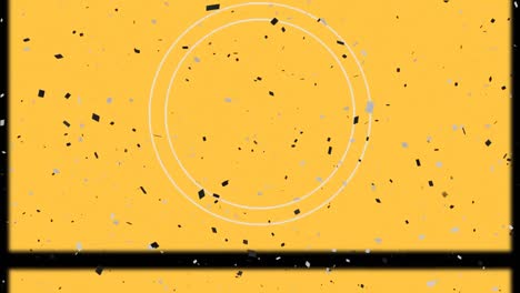 Digital-animation-of-film-reel-effect-over-confetti-falling-against-yellow-background