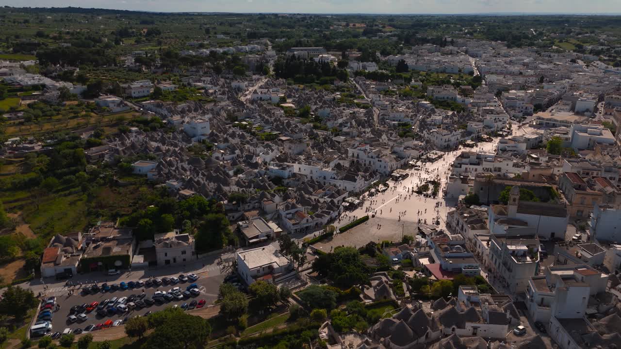 Iconic Trulli houses of Alberobello, Apulia, Italy. Travel destination, UNESCO old town. Aerial drone