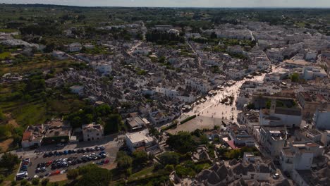 iconic trulli houses of alberobello, apulia, italy. travel destination, unesco old town. aerial drone
