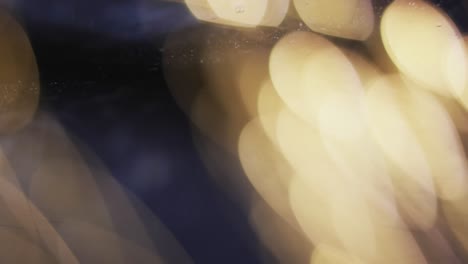 video de puntos de luz bokeh amarillos parpadeantes con espacio de copia