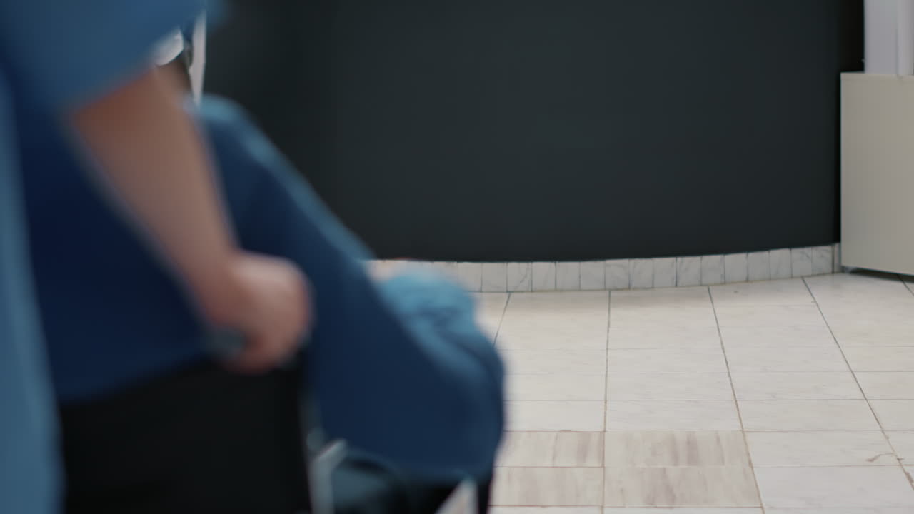 Medical Professionals Assisting Patient in Clinic