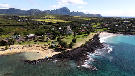 aerial shot toward poipu beach on clear day