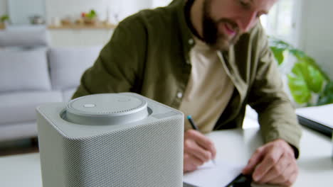 close up view of smart speaker on a desk