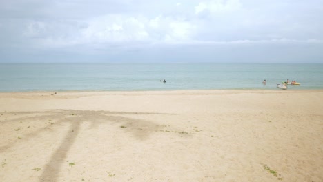 natural sea wave water with foam on the sandy beauty white beach, summer beach seascape