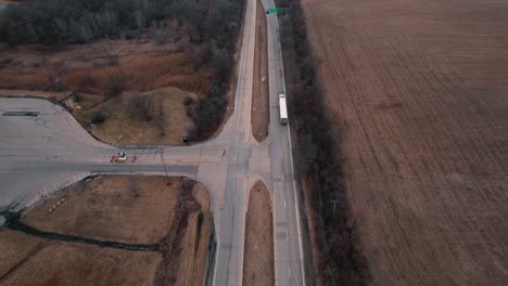 Semi-trailer-truck-speeds-on-ramp-entering-Interstate-highway-I-94-Illinois