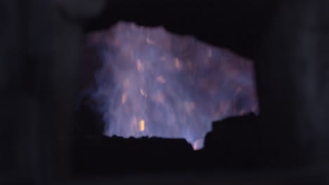 burning wood in a stove