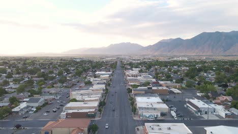 main street in the small town of spanish fork, utah - aerial view at sunset