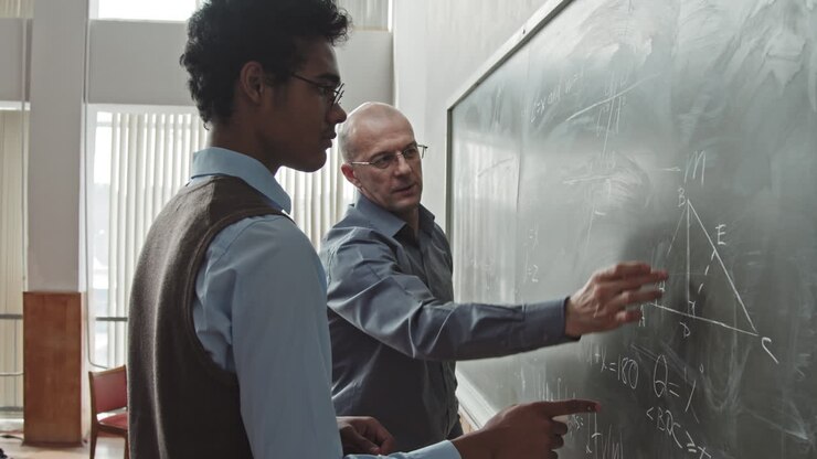Professor Helping Student to Solve Geometry Problem