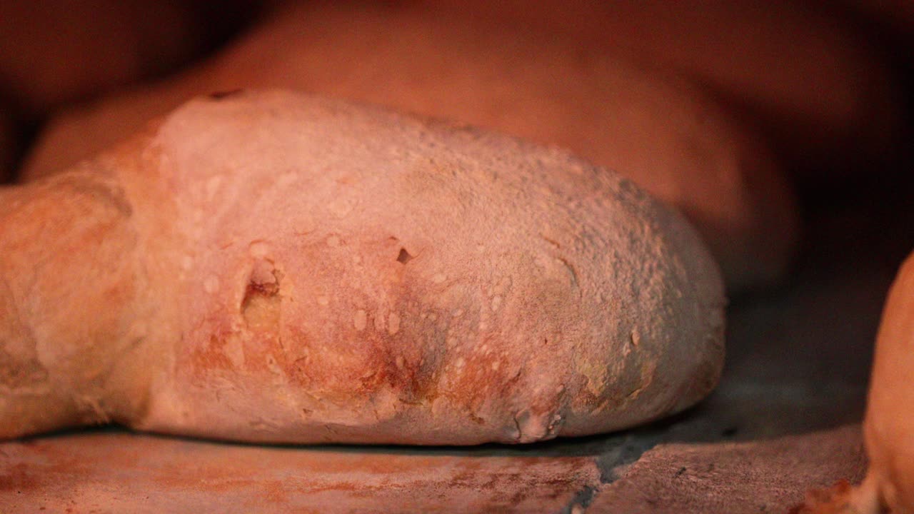 Bread Baked Inside The Traditional Oven In The Bakery