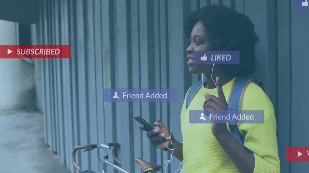 Animation of social media notifications over happy african american woman using smartphone in street