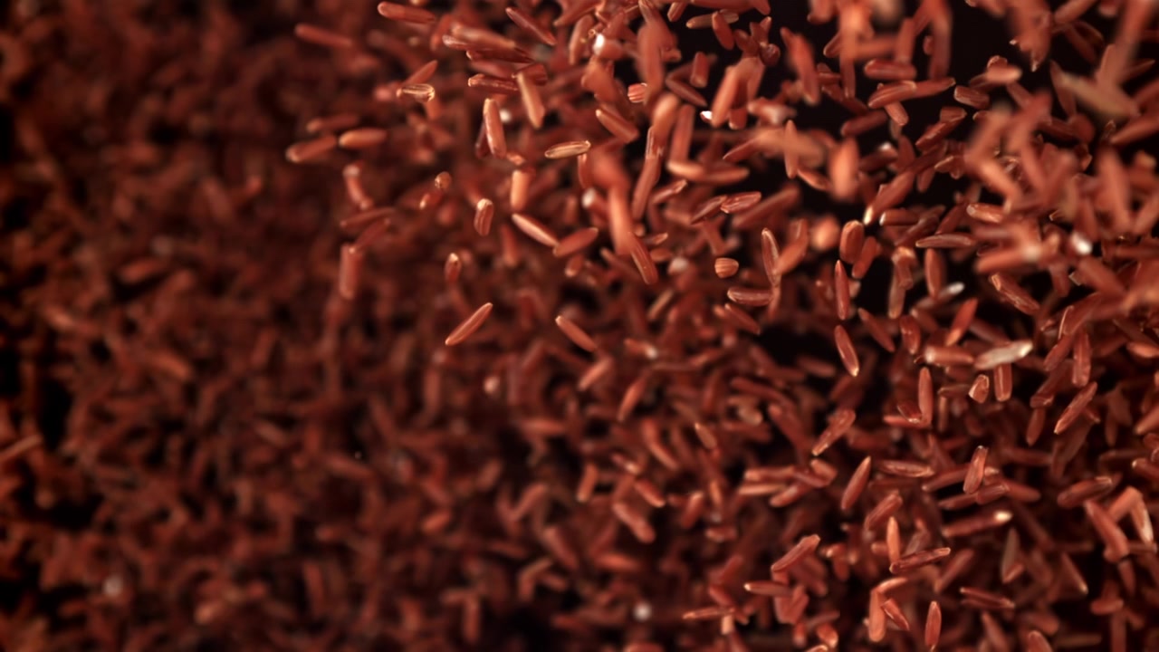 Super Slow Motion of Red Rice Grains Falling and Bouncing