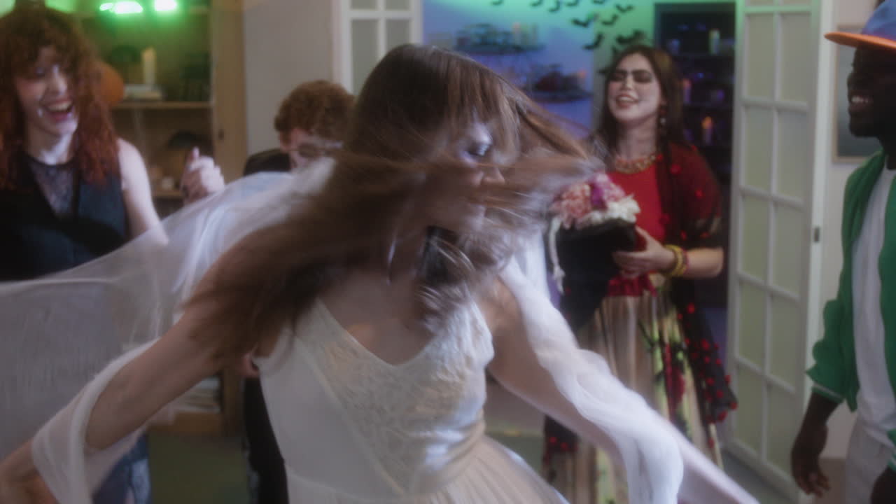 Halloween Party with Friends in Costumes