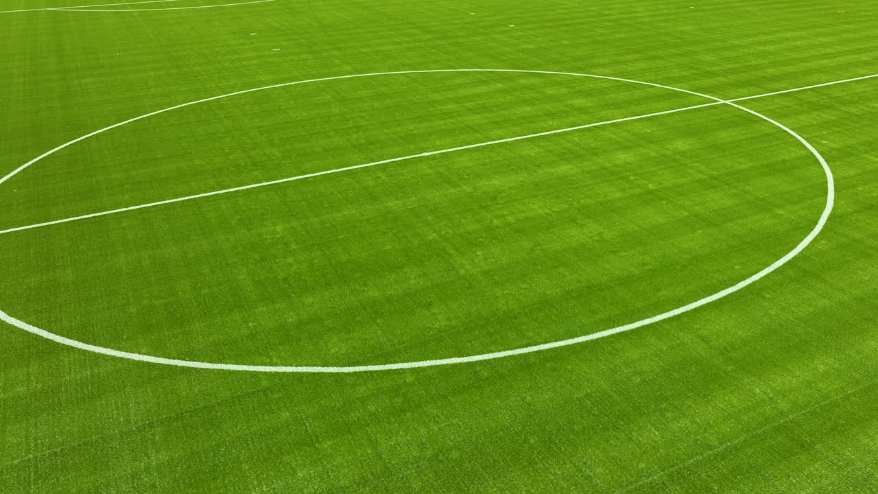 Premium Stock Video - Aerial Close-up Of A Soccer Field's Central 