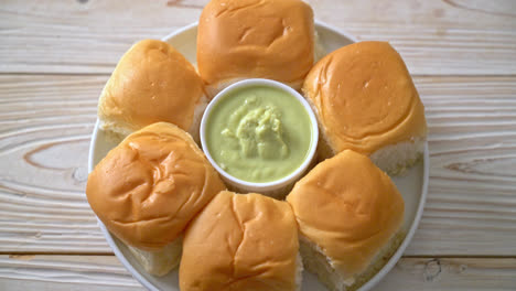 bread with thai pandan custard  on plate