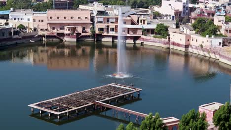 holy pond at the middle of city from top